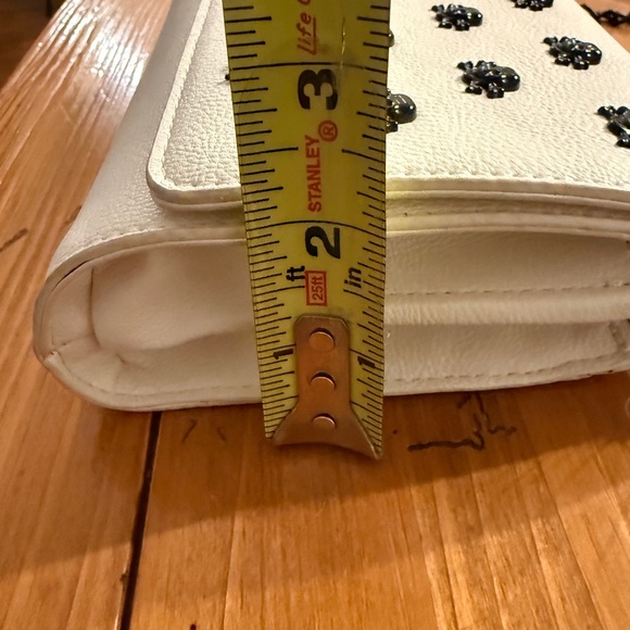 Betsey Johnson White Faux Leather Crossbody Bag with Black Skull Studs. - Picture 15 of 16